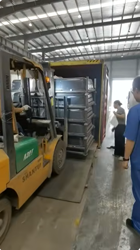 Container Loading in Progress: Precision Handling for Overseas Machinery Shipment
